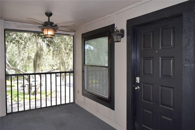 property entrance featuring ceiling fan