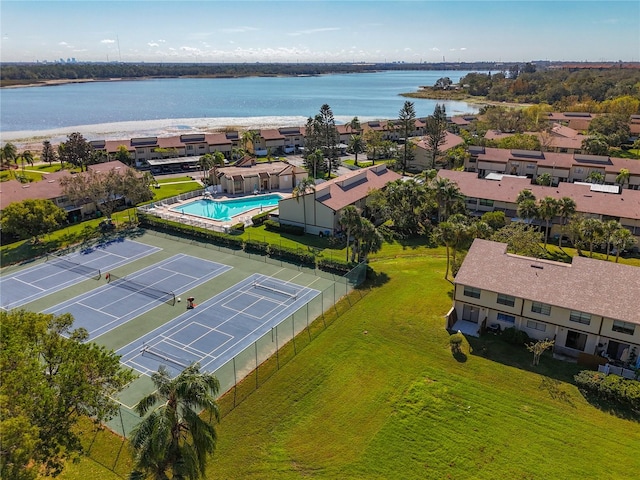 drone / aerial view with a water view