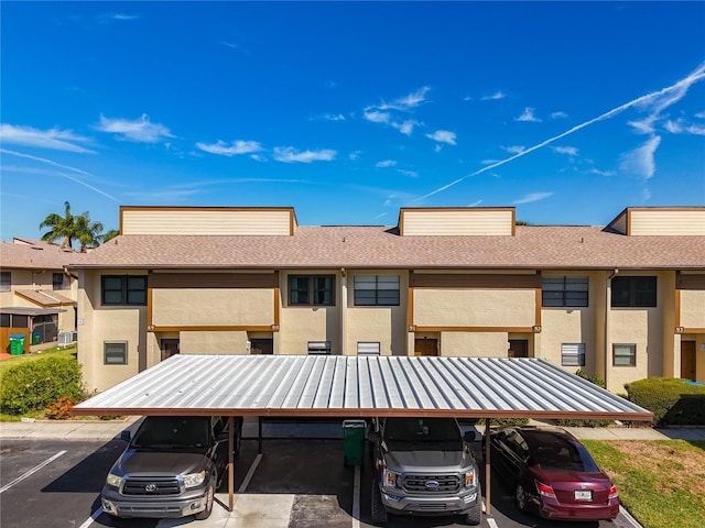 view of front of house featuring a carport