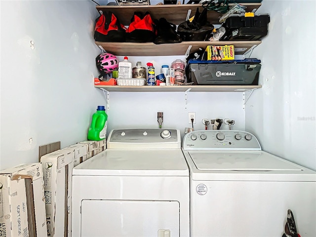 laundry area with independent washer and dryer