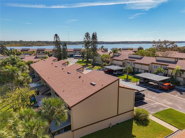 bird's eye view with a water view