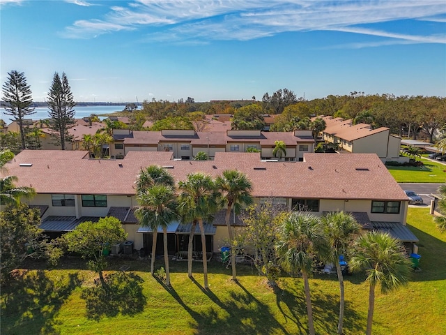 aerial view featuring a water view