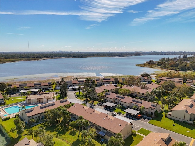 birds eye view of property featuring a water view