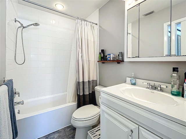 full bathroom with tile patterned flooring, vanity, toilet, and shower / bath combo with shower curtain