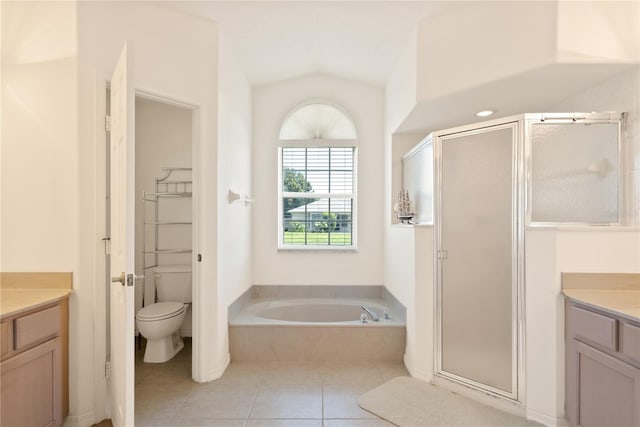 full bathroom with vanity, shower with separate bathtub, and toilet