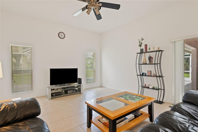 2152 SE Harding St, Port Saint Lucie, FL 34952 - living area with ceiling fan and light tile patterned flooring