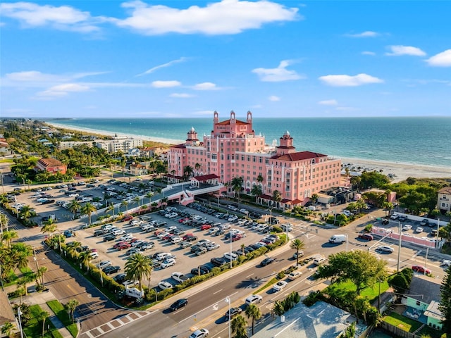 bird's eye view featuring a water view and a view of the beach