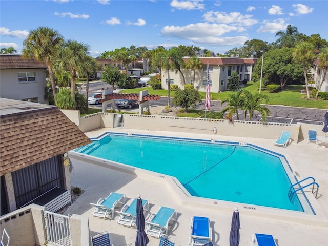 view of swimming pool featuring a patio