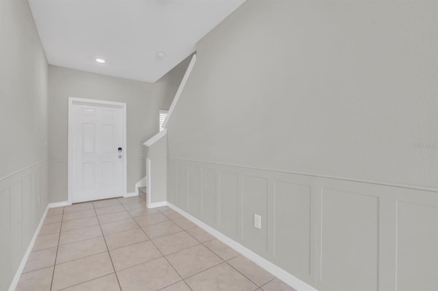 interior space with light tile patterned floors