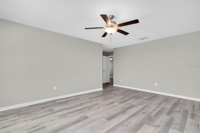 unfurnished room with light hardwood / wood-style floors and ceiling fan