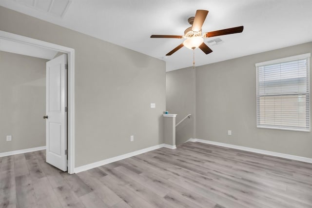 unfurnished room with light hardwood / wood-style floors and ceiling fan