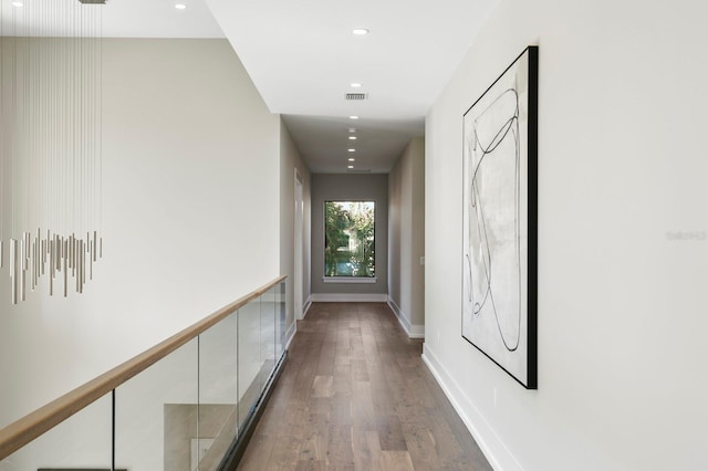 hallway featuring dark wood-type flooring