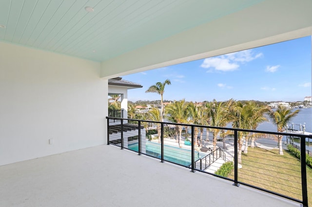 balcony featuring a water view