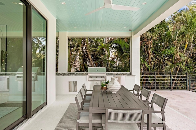 sunroom / solarium with wood ceiling and ceiling fan