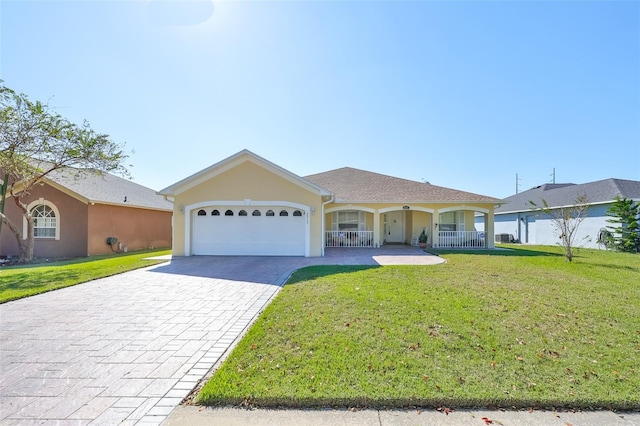 single story home with a front yard, a porch, and a garage