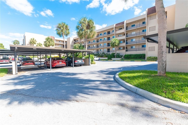 exterior space with a carport