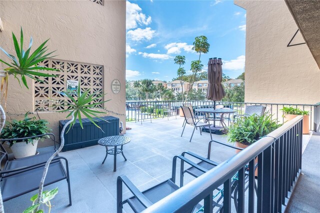 90 S Highland Ave Unit 1115, Tarpon Springs, FL 34689 - view of patio / terrace featuring outdoor dining space