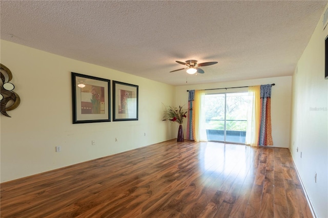 90 S Highland Ave Unit 1115, Tarpon Springs, FL 34689 - empty room featuring visible vents, wood finished floors, ceiling fan, and a textured ceiling