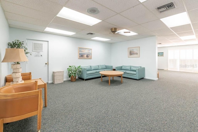 90 S Highland Ave Unit 1115, Tarpon Springs, FL 34689 - carpeted living area featuring baseboards, visible vents, and a drop ceiling