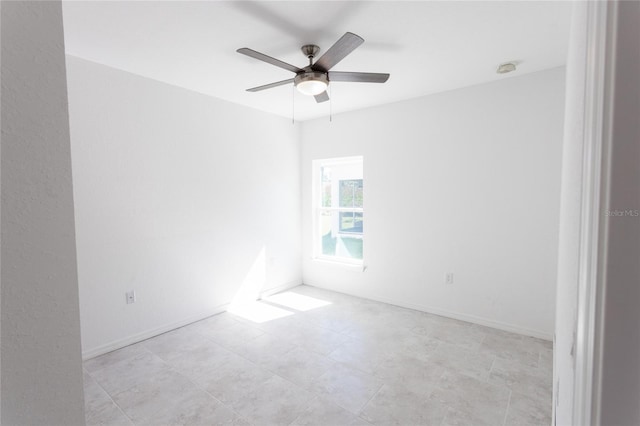 spare room featuring ceiling fan