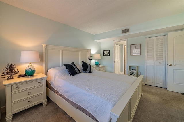 carpeted bedroom with a closet