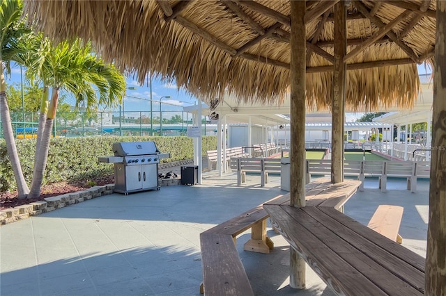 view of patio with a gazebo and a grill