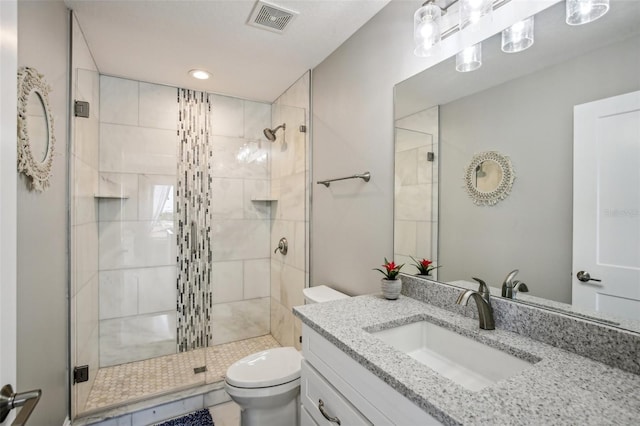 339 55th Ave, St Pete Beach, FL 33706 - bathroom with toilet, a stall shower, vanity, and recessed lighting