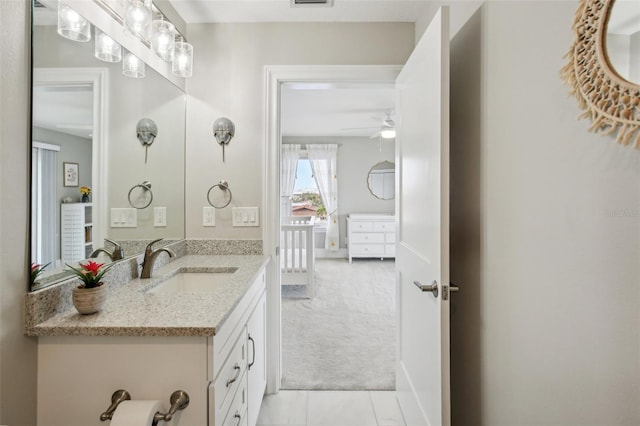 bathroom with vanity and ceiling fan