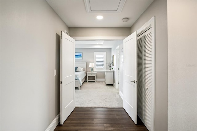 hallway featuring dark wood-type flooring