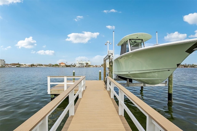 dock area featuring a water view