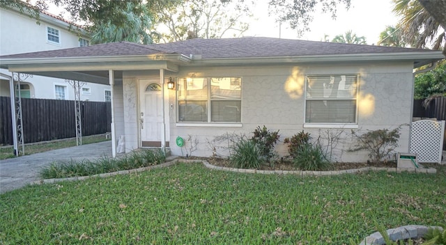 view of front of home with a front lawn