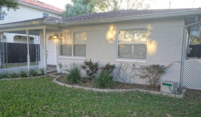 exterior space with a lawn