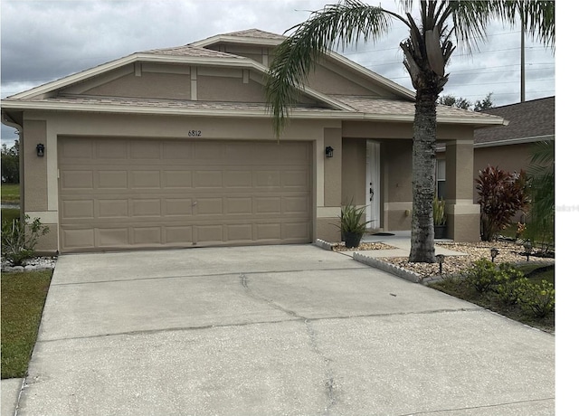 view of front of property with a garage