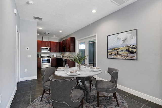 view of tiled dining space