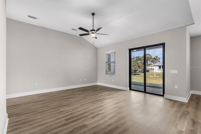 unfurnished room featuring wood-type flooring, lofted ceiling, and ceiling fan