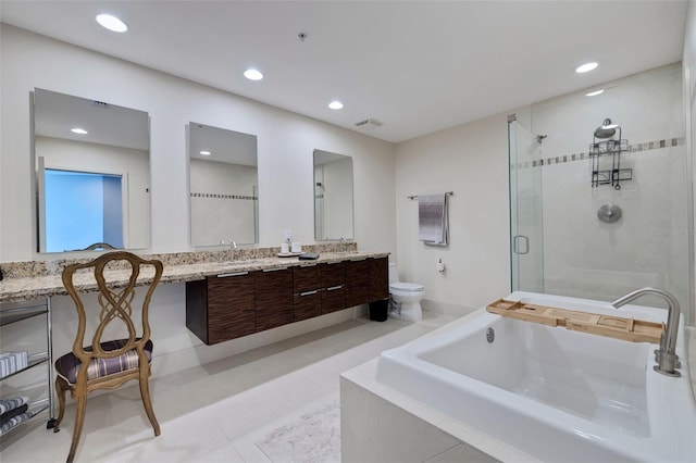 full bathroom with vanity, toilet, separate shower and tub, and tile patterned flooring