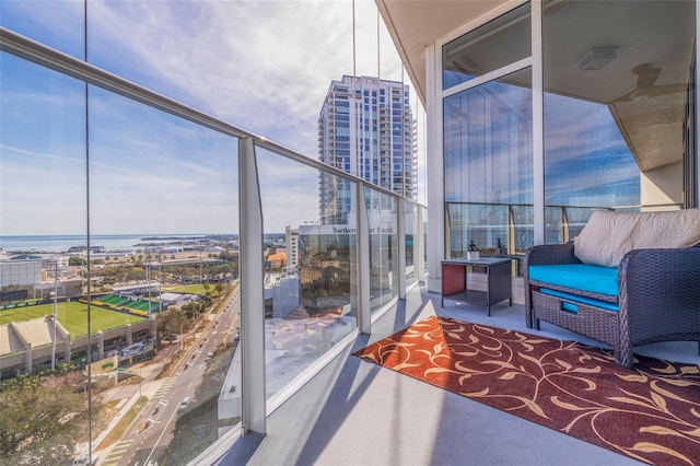 balcony featuring a water view