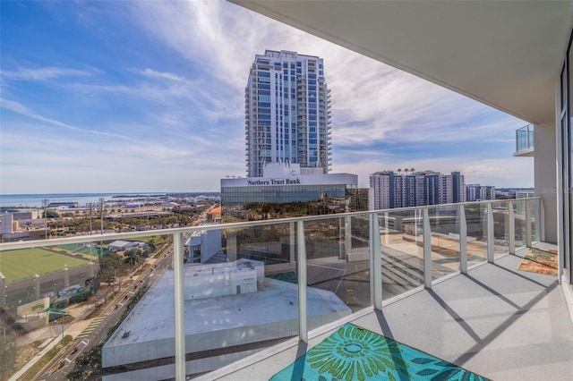 balcony featuring a water view