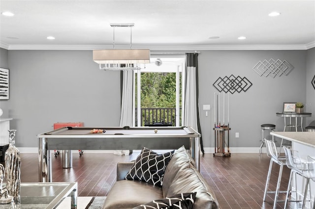 game room with crown molding and dark hardwood / wood-style floors