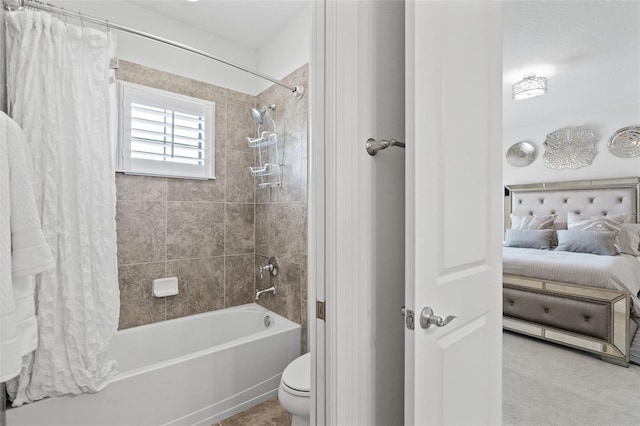 bathroom featuring toilet and shower / tub combo with curtain