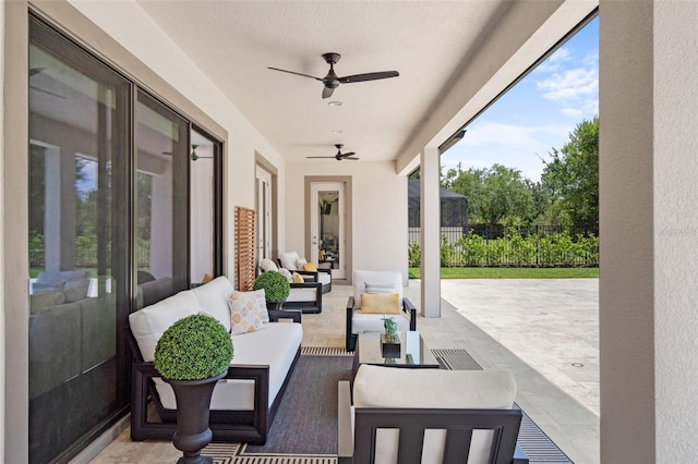 view of patio / terrace featuring ceiling fan and outdoor lounge area