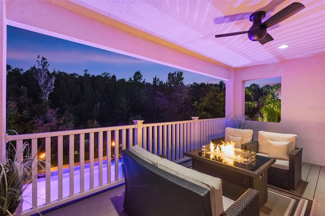 deck at dusk with ceiling fan