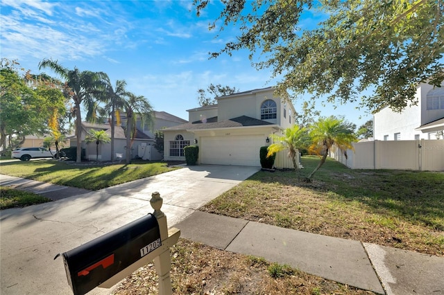 view of front of home with a front lawn and a garage