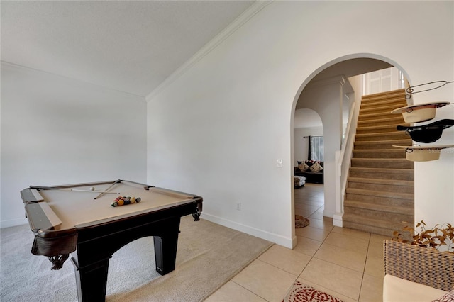 rec room featuring ornamental molding, vaulted ceiling, light tile patterned flooring, and billiards