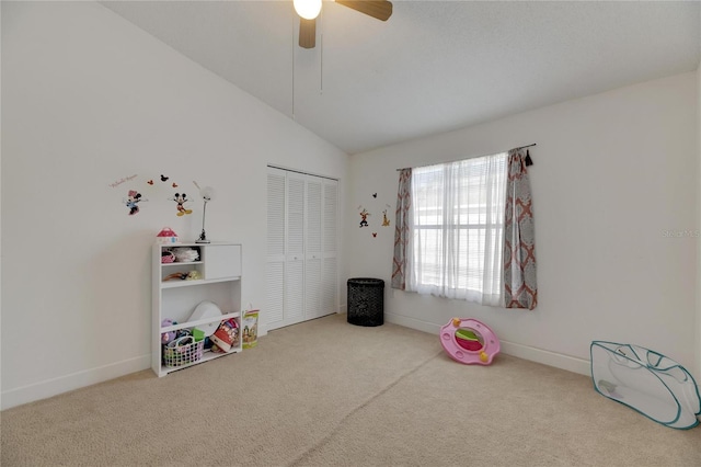 rec room with lofted ceiling, carpet floors, and ceiling fan