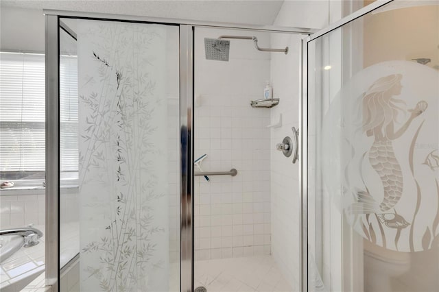 bathroom featuring an enclosed shower