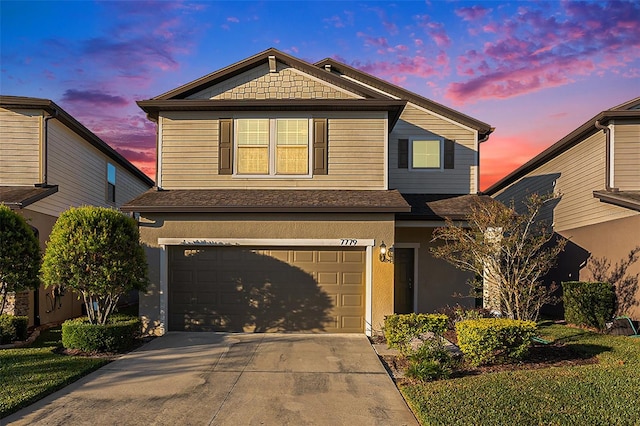 view of front of property featuring a garage