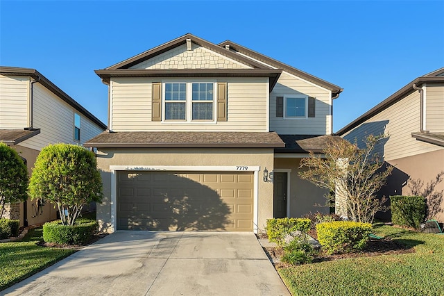 view of front of property featuring a garage