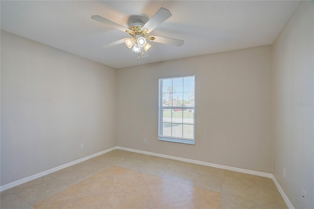 unfurnished room with light tile patterned floors and ceiling fan