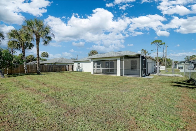 view of yard featuring a sunroom